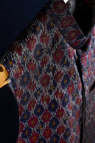 Embroidered red and blue ikat nehru jacket in raw silk