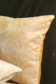 Off-white suede cushion cover with mustard hand block print