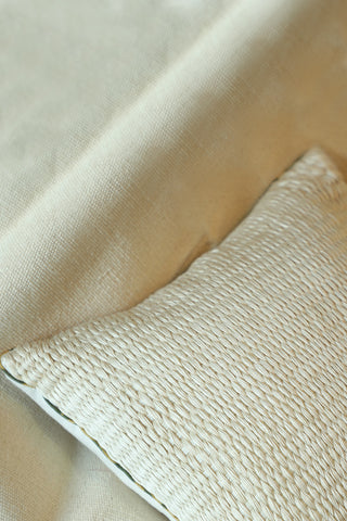 Off-white cotton cushion cover with woven embroidery