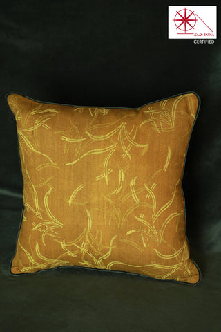 Textured (khadi) cushion cover with vibrant yellow hand block print